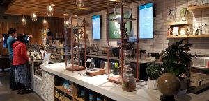 View of the coffee robots on the counter of Ada's Discovery Cafe