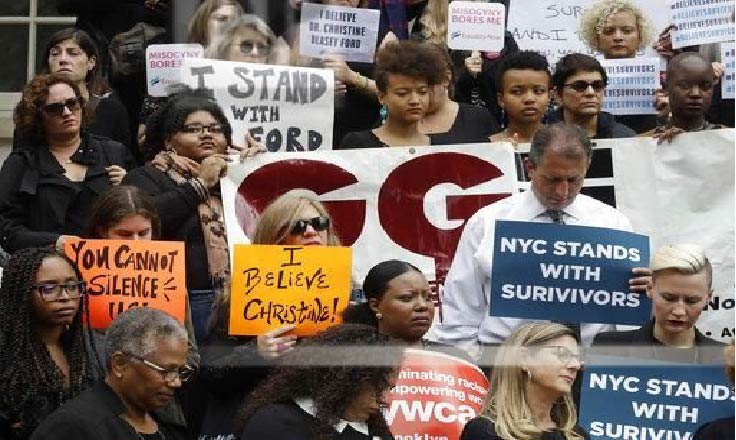 Protesters with signs